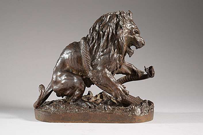 LION TERRASSANT UN SERPENT